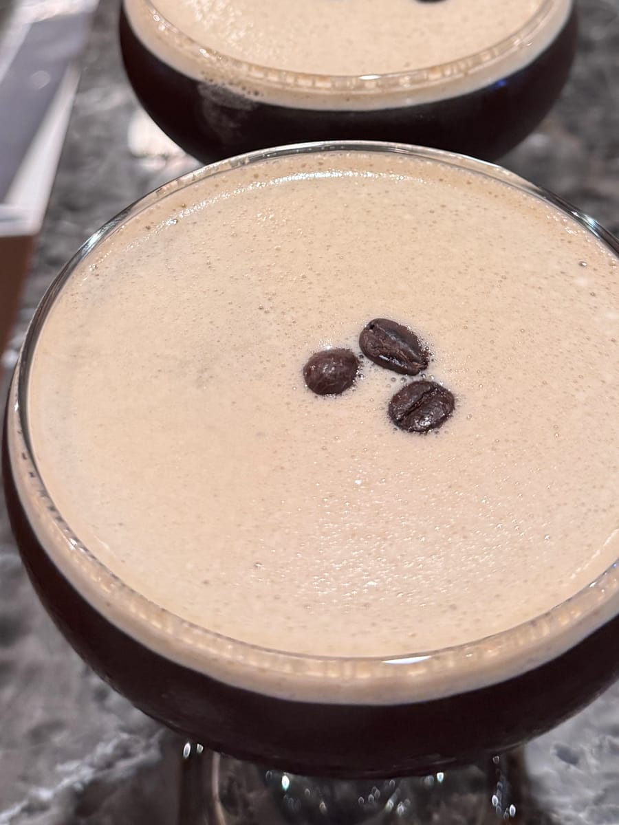 A lineup of espresso martinis on the bar at Dark Horse Brew