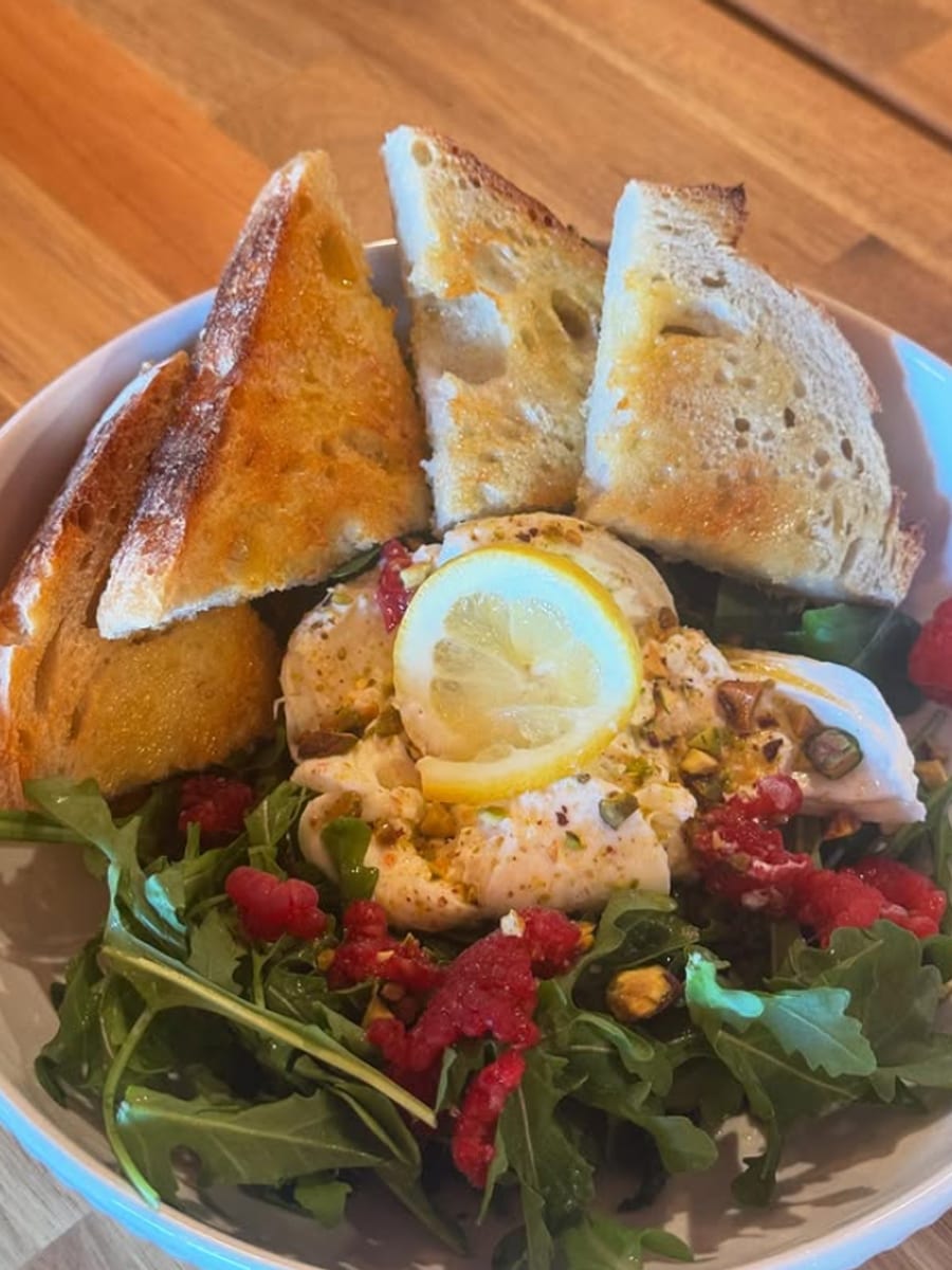 The Berry Burrata Salad at Dark Horse Brew — arugula, burrata, fresh berries, and pistachios with toasted sourdough